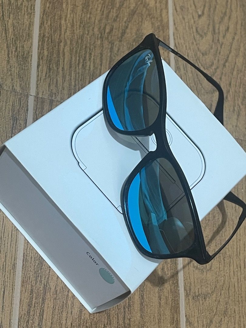 Ray-Ban Sunglasses with Blue Mirror Lenses (Category: Babies & Kids Fashion) located in Marikina City. Submitted by bezz_bezzy (Listing ID 1463578093, Image 1). Description: - Authentic Black Ray-Ban Sunglasses - Striking Blue Mirror Lenses - Ideal for Sunny Weather - minor scratch on left lens but not affecting function - Feel free to ask any questions!.