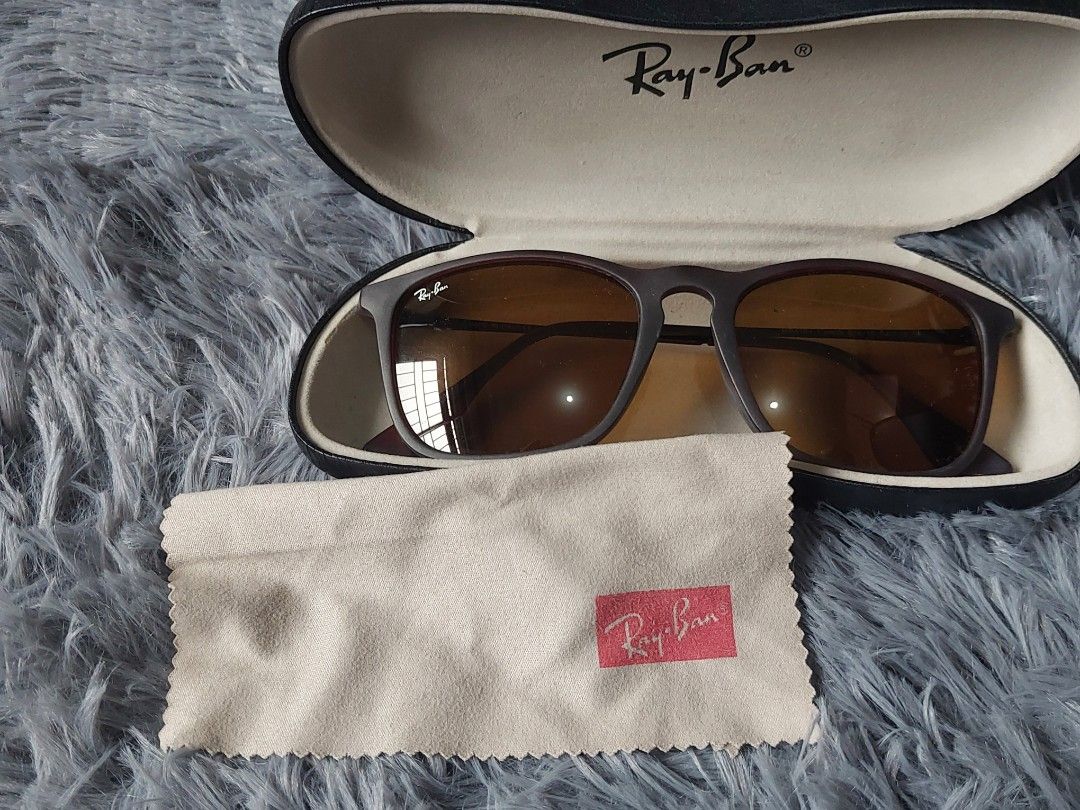 Ray-Ban Sunglasses with Case and Cleaning Cloth (Category: Sunglasses & Eyewear) located in Calasiao. Submitted by _annetastic_ (Listing ID 1463669140, Image 3). Description: - Authentic Ray-Ban sunglasses ( unisex) - Dark matte frame- brown tinted lenses - Comes with original hard case 💯 Authentic 📦 Preloved / excellent condition 😎 Perfect for everyday wear & OOTD 🎁 Great gift idea too! SULIT DEAL — KUNIN NA!.
