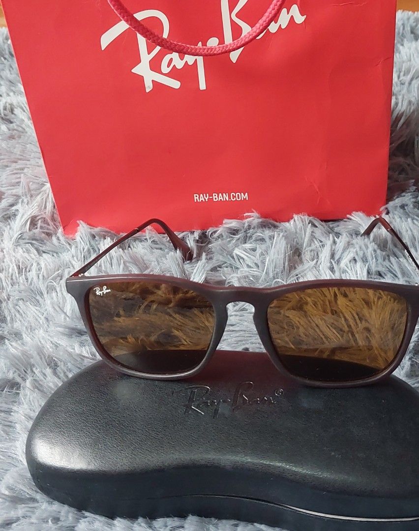 Ray-Ban Sunglasses with Case and Cleaning Cloth (Category: Sunglasses & Eyewear) located in Calasiao. Submitted by _annetastic_ (Listing ID 1463669140, Image 2). Description: - Authentic Ray-Ban sunglasses ( unisex) - Dark matte frame- brown tinted lenses - Comes with original hard case 💯 Authentic 📦 Preloved / excellent condition 😎 Perfect for everyday wear & OOTD 🎁 Great gift idea too! SULIT DEAL — KUNIN NA!.