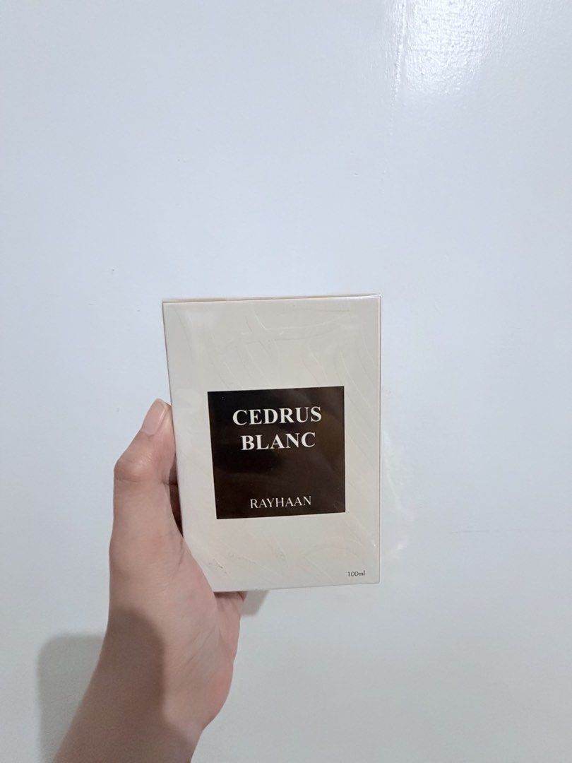 Rayhaan Cedrus Blanc Eau de Parfum 100ml (Category: Fragrance & Deodorants) located in Imus. Submitted by pambihira__ (Listing ID 1463620739, Image 2). Description: - Cedrus Blanc by Rayhaan Eau de Parfum - 100ml bottle - Inspired by Carolina Herrera Cedar Chic - Fragrance Profile: Aldehydic, Citrus, Woody, Fresh, Soapy, Fresh Spicy - Top Notes: Aldehydes, Bergamot - Middle Note: Orange - Base Note: Cedarwood - Condition: Brand new in box ✨On-han