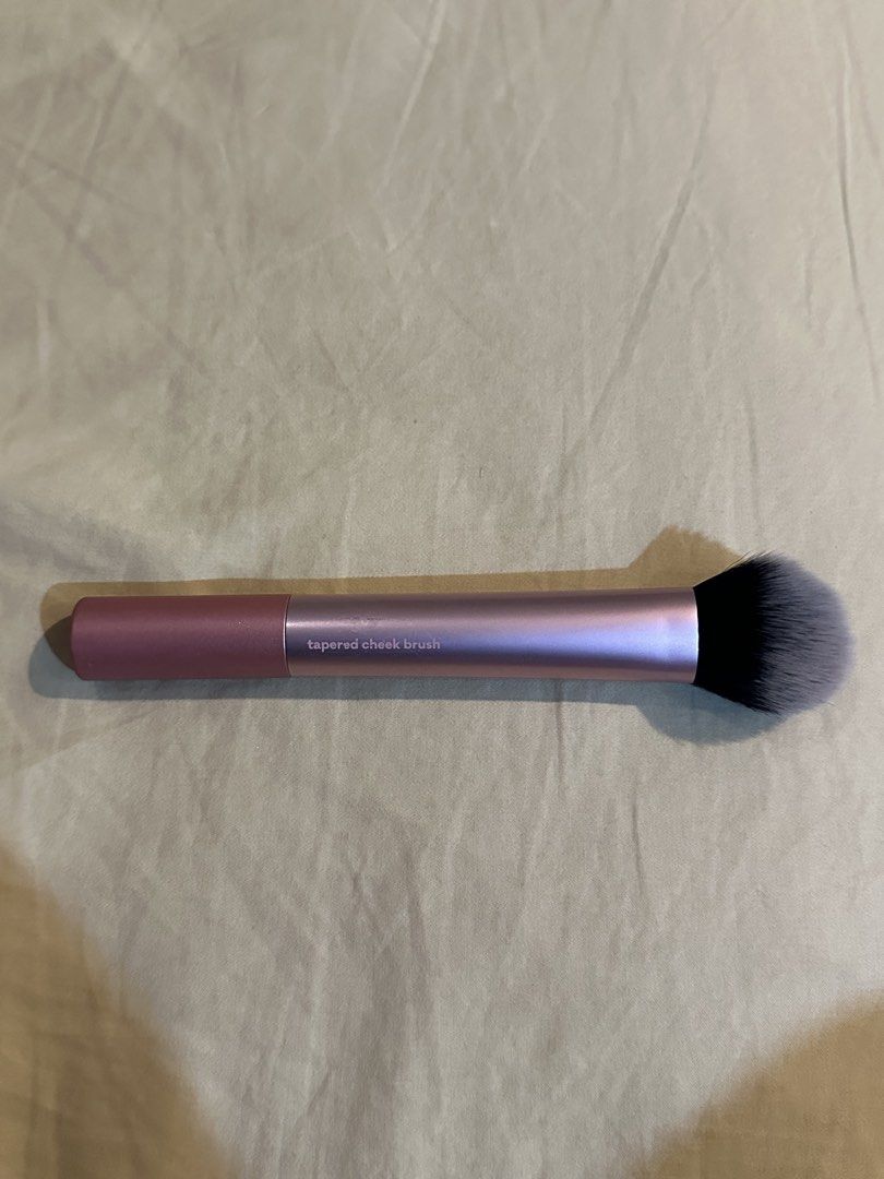 Real Techniques RT 449 Tapered Cheek Brush Rose Gold (Category: Makeup) located in Malabon City. Submitted by alysaleee (Listing ID 1463690853, Image 2). Description: - Real Techniques RT 449 Tapered Cheek Brush - Elegant rose gold handle - Ideal for applying blush or bronzer - Features soft and dense bristles.