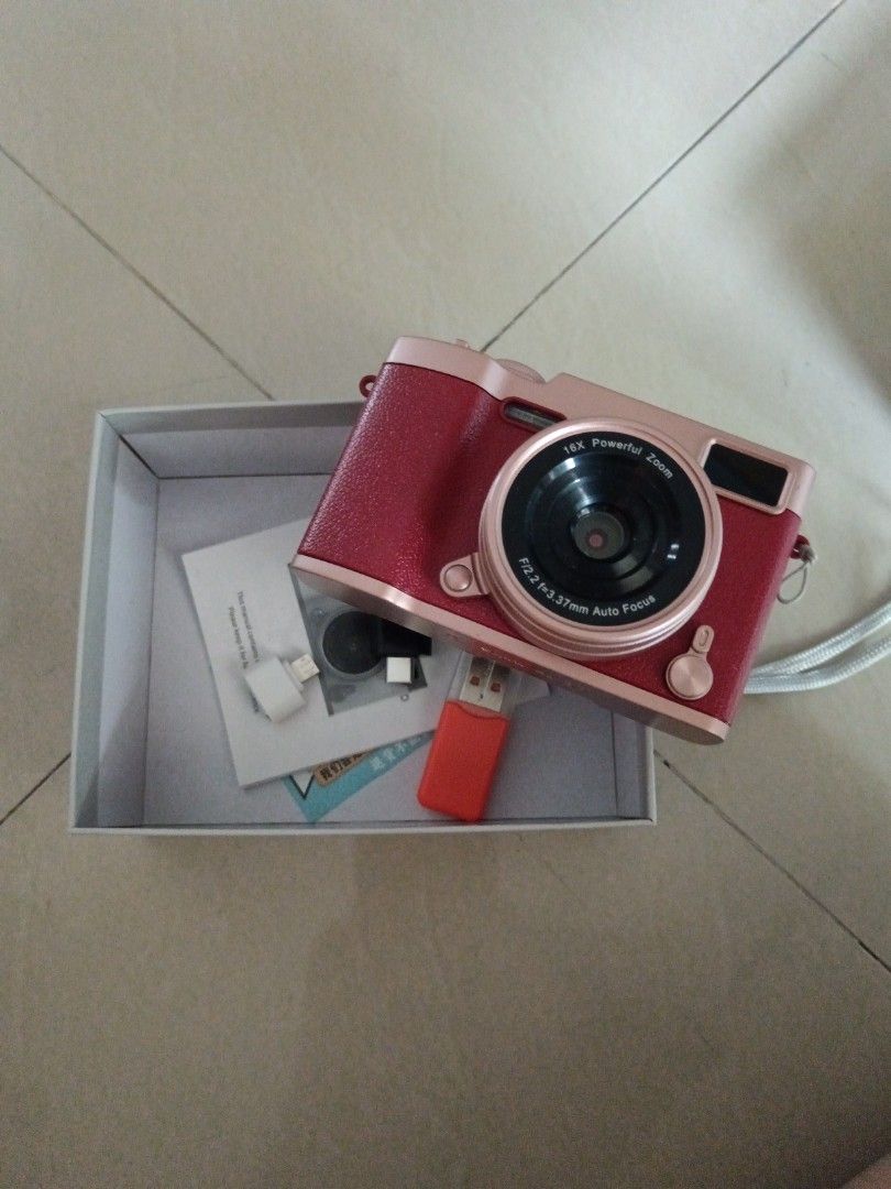 Red camera (Category: Cameras) located in Kuala Lumpur. Submitted by _sims_ (Listing ID 1463640528, Image 3). Description: This is a camera my sister brought for me for my birthday gift but I didn't use it at all so I am selling it hope u guys like it and will buy it thanks😊.