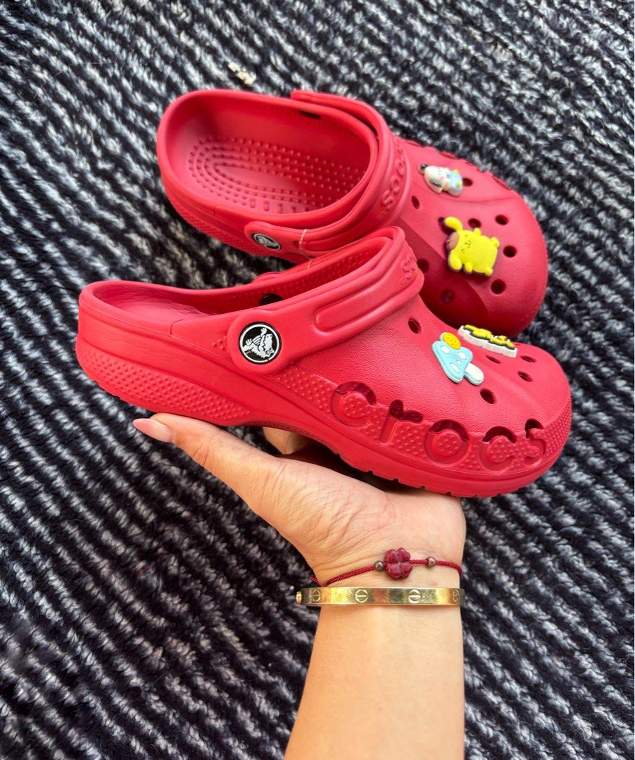 Red Crocs with Charms - Kids Size (Category: Babies & Kids Fashion) located in Digos. Submitted by kathydiane76376 (Listing ID 1463690827, Image 2). Description: - Cute red Crocs for kids - Comes with fun cartoon charms (Winnie the Pooh, Mickey Mouse, Pikachu) - Easy to slip on and off - Great for playtime or casual wear - Perfect for character-loving kids.