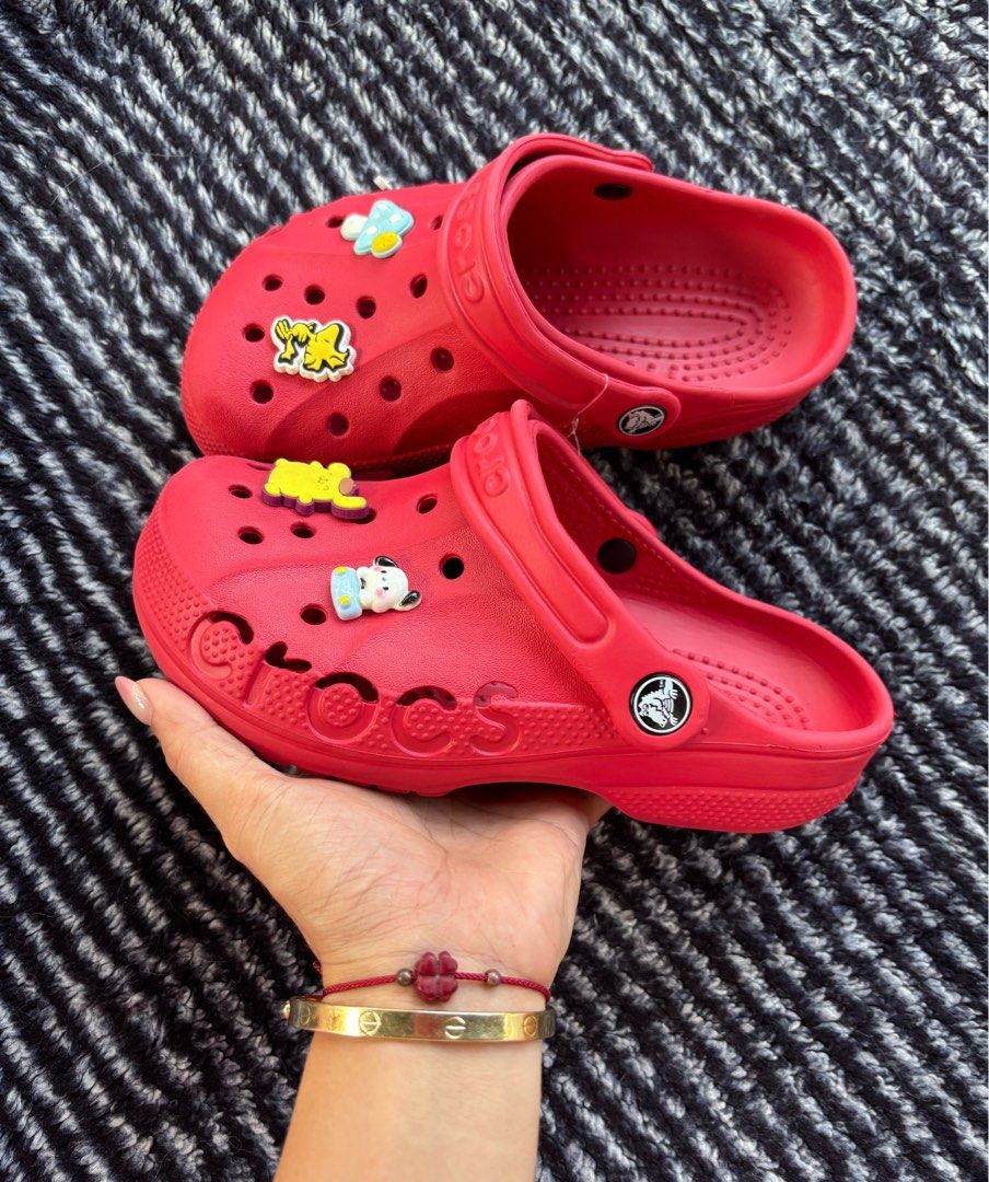 Red Crocs with Charms - Kids Size (Category: Babies & Kids Fashion) located in Digos. Submitted by kathydiane76376 (Listing ID 1463690827, Image 1). Description: - Cute red Crocs for kids - Comes with fun cartoon charms (Winnie the Pooh, Mickey Mouse, Pikachu) - Easy to slip on and off - Great for playtime or casual wear - Perfect for character-loving kids.