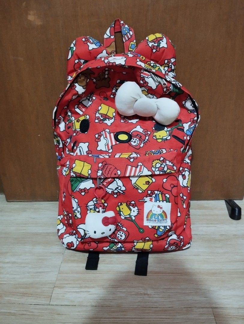 Red Hello Kitty All-Over Print Backpack with Ears (Category: Backpacks) located in Pasig City. Submitted by cityshopperph (Listing ID 1463618715, Image 1). Description: - Adorable red backpack featuring a fun all-over Kitty print. - Iconic Kitty bow detail on the front. - Cute Kitty ears on top. - Ideal for school or everyday adventures. - Features adjustable straps for a comfortable fit..