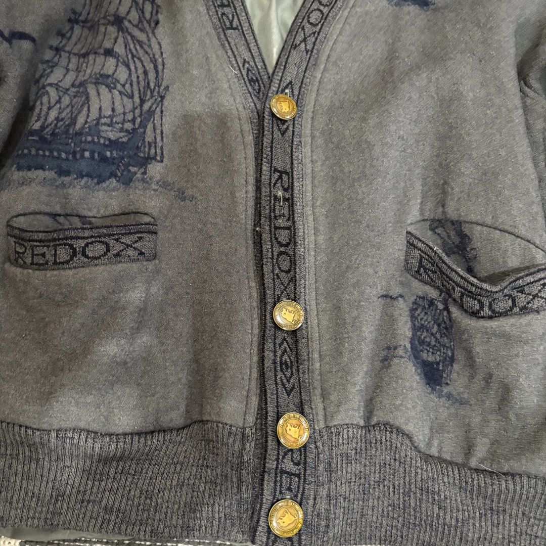 REDOX Vintage Ship Print Button Up Cardigan (Category: Coats, Jackets and Outerwear) located in Makati City. Submitted by sseurekiii (Listing ID 1463722048, Image 2). Description: - Vintage REDOX cardigan - Dark grey with all-over navy blue ship print - Button-up front with gold-tone buttons - Ribbed cuffs and hem - Statement piece for your wardrobe - issue: It shrunk sa laundry, so it fits small na 😭.