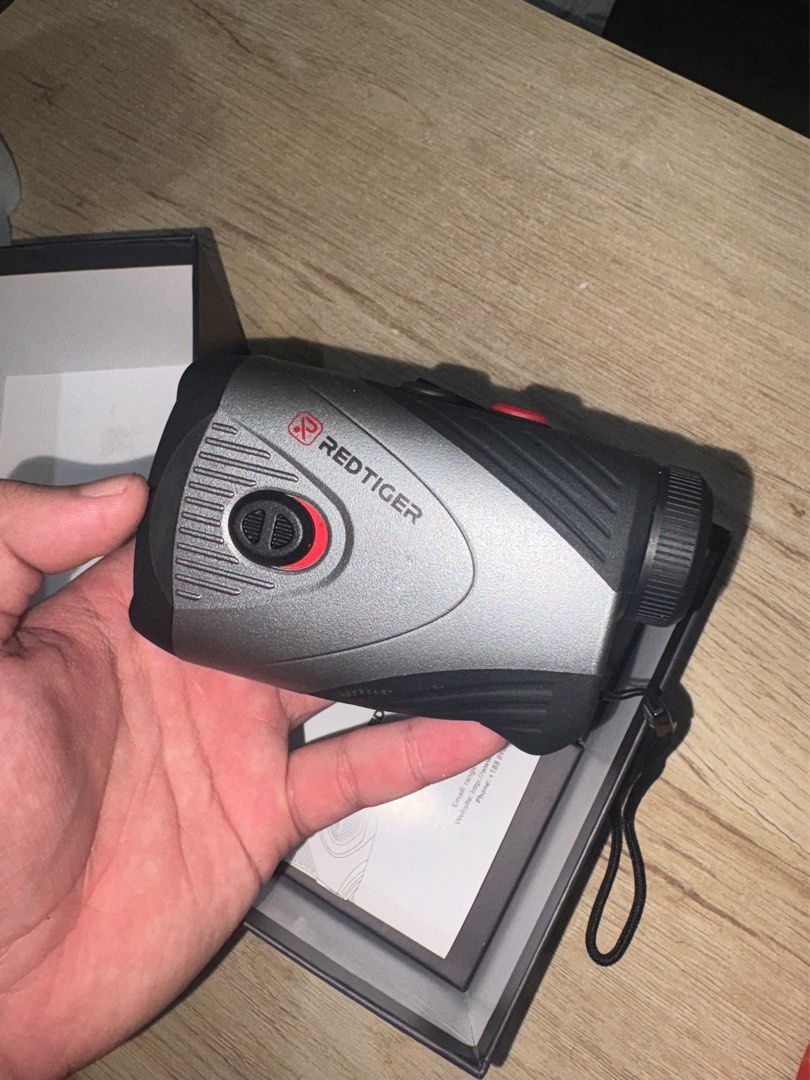 REDTIGER C001B Golf Rangefinder (Category: Golf) located in Manila. Submitted by seaottercat (Listing ID 1463703031, Image 2). Description: REDTIGER C001B Golf Rangefinder – Like New Selling my REDTIGER C001B Golf Rangefinder. Used only 2–3 times, so it’s still in very good condition and works perfectly. • 1200-yard range • 7X magnification • Slope function • Flag-lock with vibration • Rechargeable • Built-in magnetic strip • Clear and easy to us