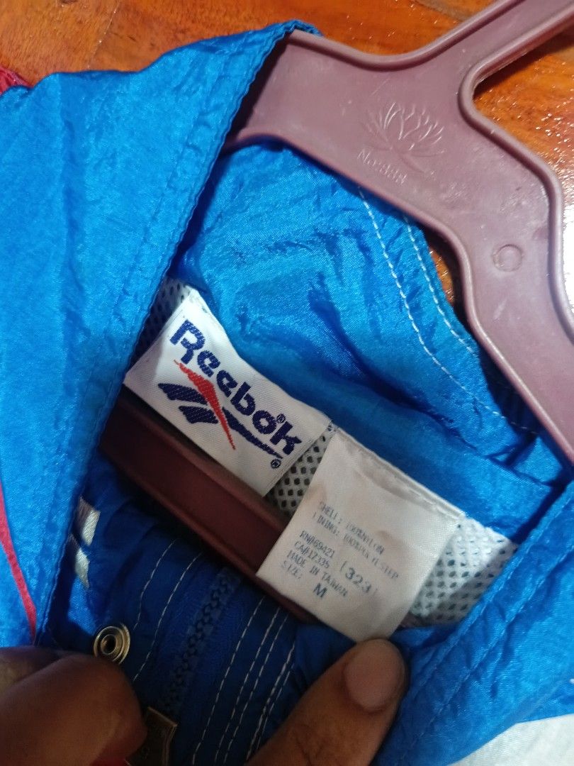 Reebok Russian Olympic Team 1996 Jacket (Category: Coats, Jackets and Outerwear) located in Panabo. Submitted by lespaulthrift (Listing ID 1463621005, Image 3). Description: - Vintage Reebok jacket - Russian Olympic Team, Atlanta 1996 - Features Russian flag colors and Olympic rings - Made in Taiwan - Size: Medium (M) - Ideal for collectors and retro sportswear enthusiasts width 24 length 26 free ship.