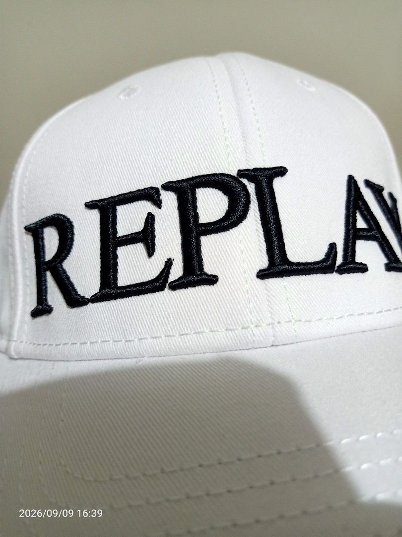 Replay White Cap/Hat (Category: Caps & Hats) located in Las Pinas. Submitted by OmengSoyT (Listing ID 1463652035, Image 2). Description: - Authetic Replay Italy Cap - Color White - Brandnew - Features black 'REPLAY' embroidery on the front - 100 % cotton - Simple and versatile design for everyday use - Adjustable strap at the back for a customized, comfortable fit,ome size fits all. - Made in China.