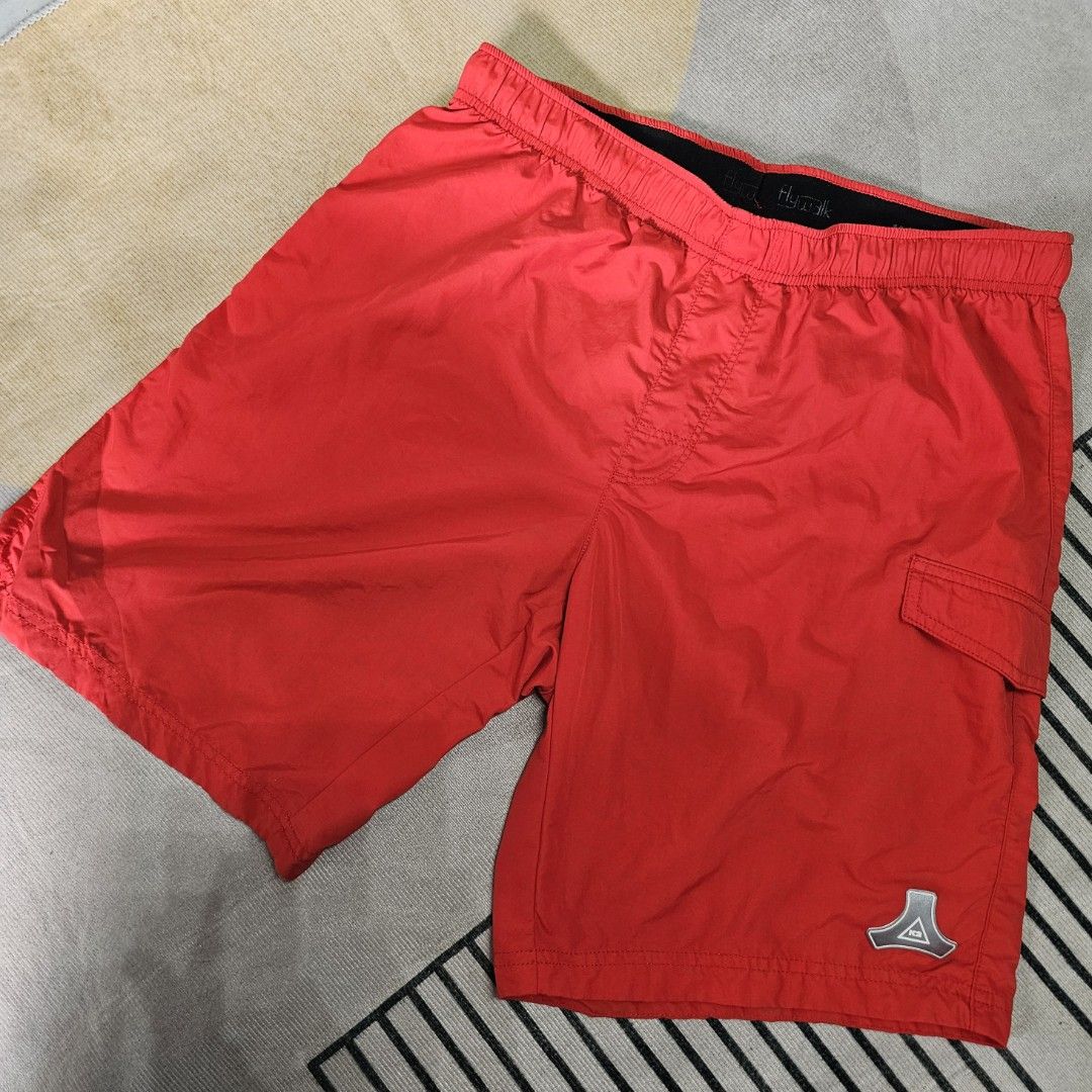 Rescue 360 Red Shorts (Category: Shorts) located in Baguio. Submitted by kayeonlineshop (Listing ID 1463620561, Image 1). Description: vibrant red swim trunks featuring an elastic waistband and a distinctive small triangular logo on the lower left hem w30-32 L18 h24.