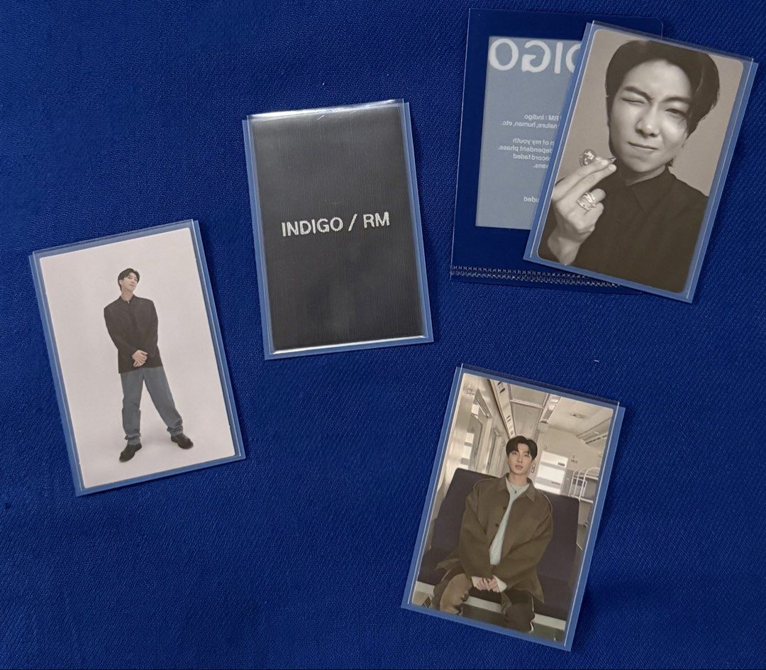 RM Indigo Photocards Set (Category: K-Wave Merchandise) located in Marikina City. Submitted by all4bangtan (Listing ID 1463702422, Image 1). Description: - Set of 3 RM Indigo photocards - One card features 'INDIGO / RM' text -One Indigo pc sleeve.