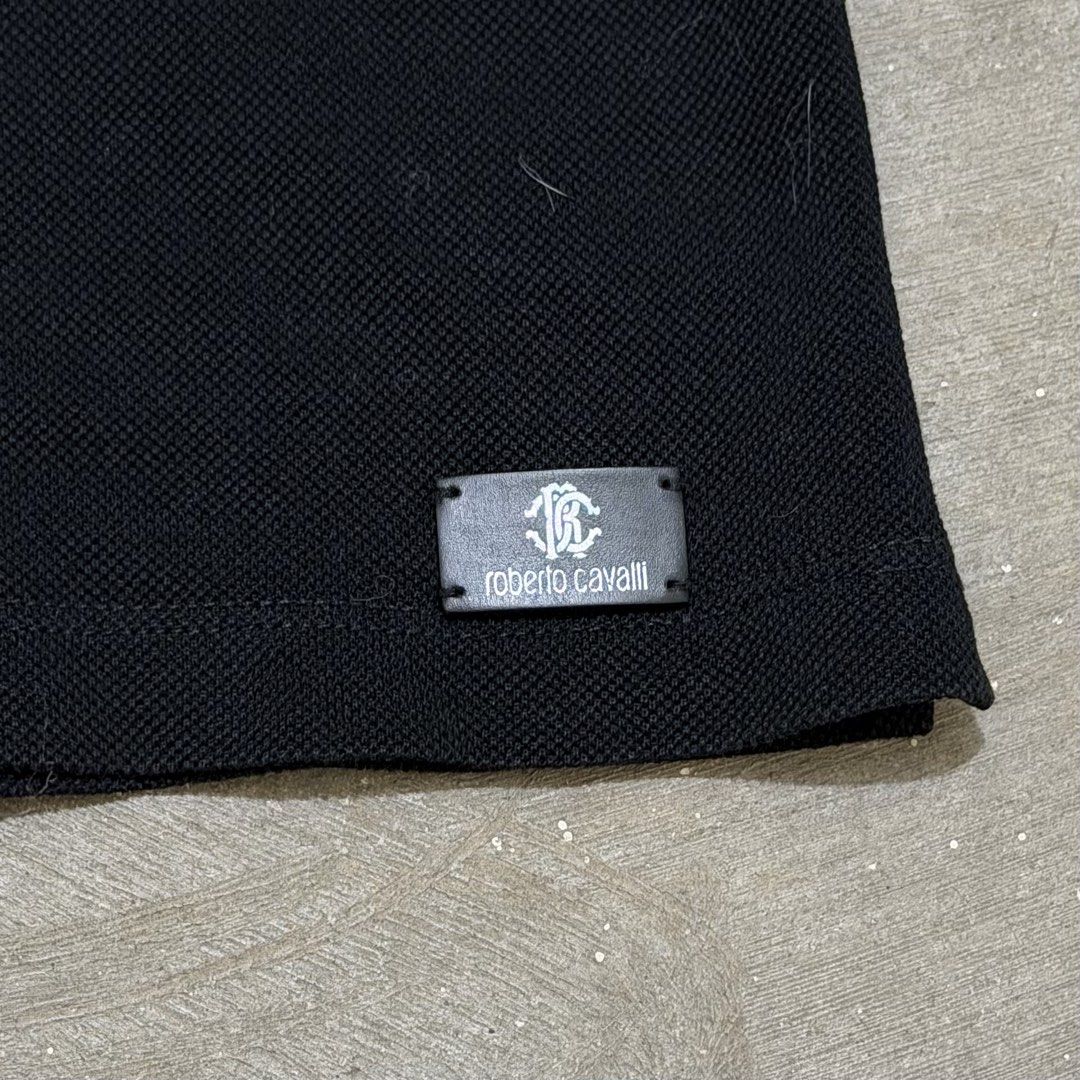 Robert Cavalli Embroidered Polo Shirt (Category: Tshirts & Polo Shirts ) located in Dinalupihan. Submitted by brokencasket (Listing ID 1463666537, Image 3). Description: Robert Cavalli Embroidered Polo Shirt Size L on tag. Measurements on photo. .