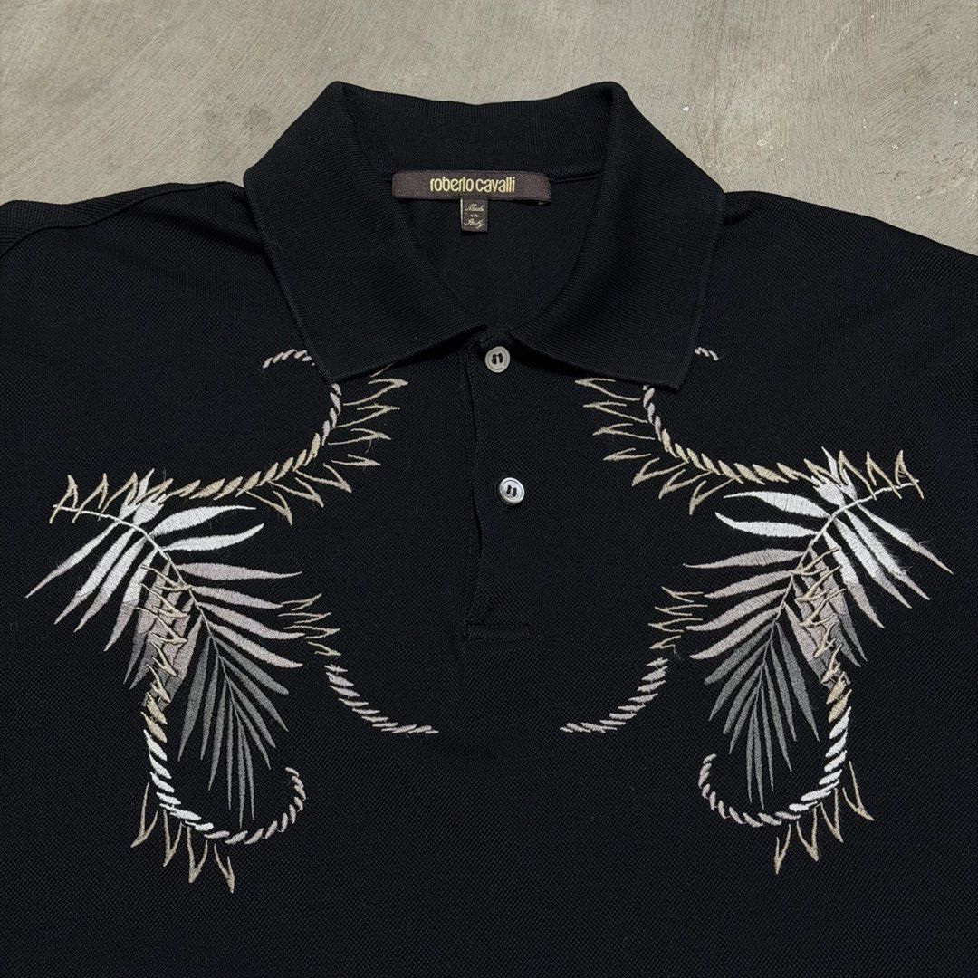 Robert Cavalli Embroidered Polo Shirt (Category: Tshirts & Polo Shirts ) located in Dinalupihan. Submitted by brokencasket (Listing ID 1463666537, Image 2). Description: Robert Cavalli Embroidered Polo Shirt Size L on tag. Measurements on photo. .