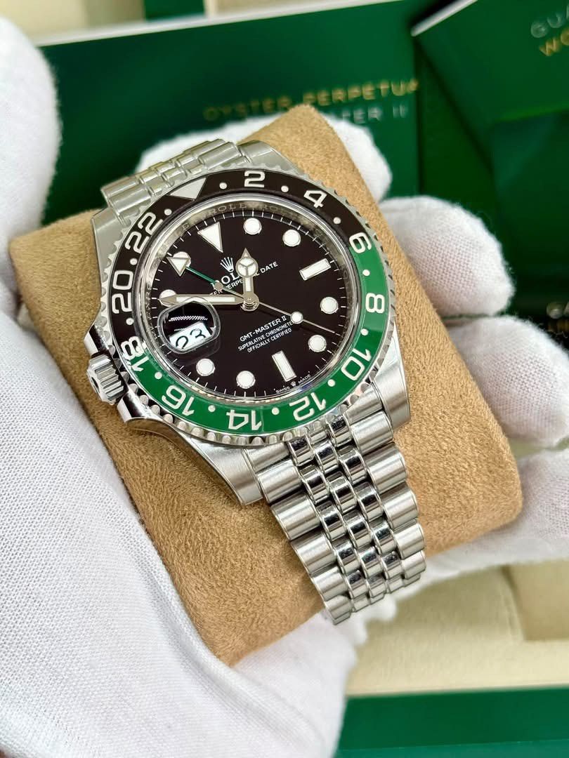Rolex GMT-Master II Oyster Perpetual Watch (Category: Luxury Watches) located in Cabanatuan. Submitted by albertgonzales27 (Listing ID 1463698642, Image 2). Description: - Rolex GMT-Master II - Black dial with iconic green bezel - Durable stainless steel Oyster bracelet - Comes complete with original box and papers - Ideal for frequent travelers and daily wear - A timeless and classic watch.