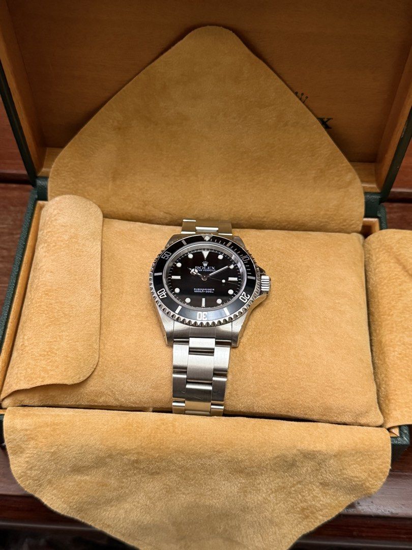 Rolex Submariner No Date 14060M (Category: Luxury Watches) located in Makati City. Submitted by jktheexplorer (Listing ID 1463631217, Image 3). Description: Full set Rolex Submariner No Date 14060M.