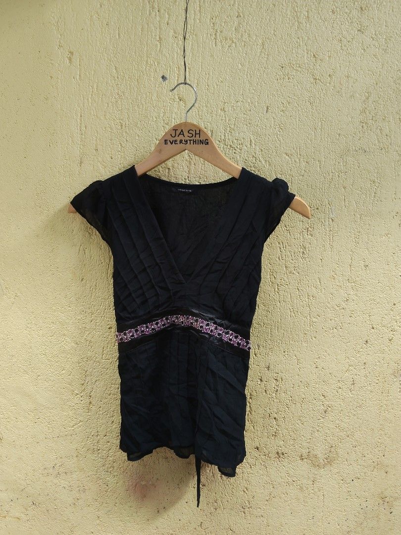 Rose Bud Black Embellished V-Neck Top (Category: Blouses) located in City of Isabela. Submitted by jasheverything (Listing ID 1463641908, Image 1). Description: - Brand: Rose Bud - Color: Black - Neckline: V-neck - Sleeves: Short sleeves - Waist Detail: Ribbon band with pink embellishments - Fabric Detail: Pleated bodice and skirt - Back Detail: Tie closure - Material: Lightweight Excellent Condition Fit M to L 650+SF.