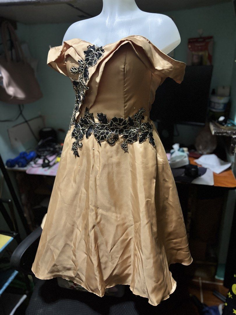 Rose Gold Off-Shoulder Gown (Category: Dresses) located in Las Pinas. Submitted by leleqt_ (Listing ID 1463704925, Image 1). Description: - Elegant rose gold off-shoulder gown. - Ideal for parties and formal occasions - Estimated size: Small to Medium - Condition: Worn only once sa JS PROM. Altered. May konting stain lang due to natambak din, yung stain is from glue nung mga naka dikit sakaniyang beads. Hindi masyadong halata. I think washable na