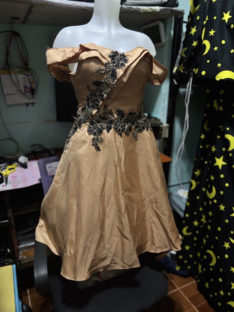 Rose Gold Off-Shoulder Gown (Category: Dresses) located in Las Pinas. Submitted by leleqt_ (Listing ID 1463704925, Image 2). Description: - Elegant rose gold off-shoulder gown. - Ideal for parties and formal occasions - Estimated size: Small to Medium - Condition: Worn only once sa JS PROM. Altered. May konting stain lang due to natambak din, yung stain is from glue nung mga naka dikit sakaniyang beads. Hindi masyadong halata. I think washable na
