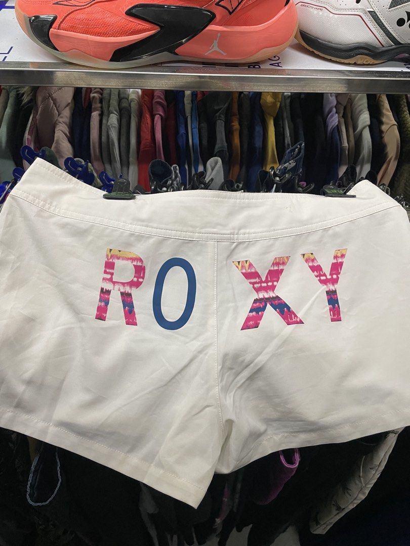 Roxy White Shorts with Logo (Category: Shorts) located in Lucena. Submitted by riyizthriftz (Listing ID 1463701474, Image 1). Description: - White Roxy shorts - Features Roxy logo on the back - Functional pockets - Button closure at the front - Small blue Roxy logo on the side.