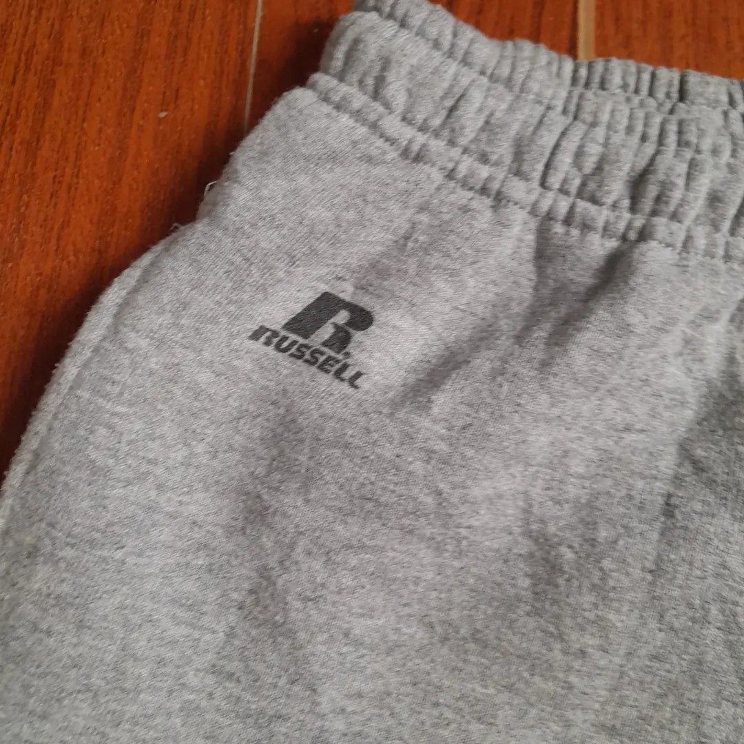 Russell Athletic Grey Sweatpants Size S/CH (Category: Joggers) located in Manila. Submitted by goldrugs (Listing ID 1463573329, Image 2). Description: - Grey sweatpants from Russell Athletic - Elastic waistband with drawstring - Made in Honduras - Cotton/Polyester blend - Comfortable for lounging or workouts - Size S/CH.