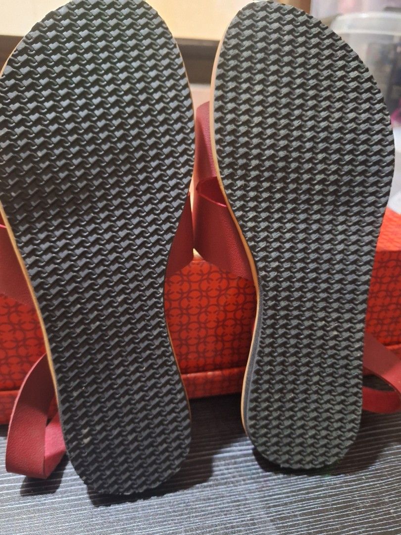 Rydax Red Flat Sandals Size 7 (Category: Flats & Sandals) located in Quezon City. Submitted by gnew024102 (Listing ID 1463596675, Image 3). Description: - Brand: Rydax - Color: Red - Style: Flat Sandals - Size: 7 - Features: Elastic strap at the back for a secure fit, comfortable sole - Occasion: Great for casual wear.