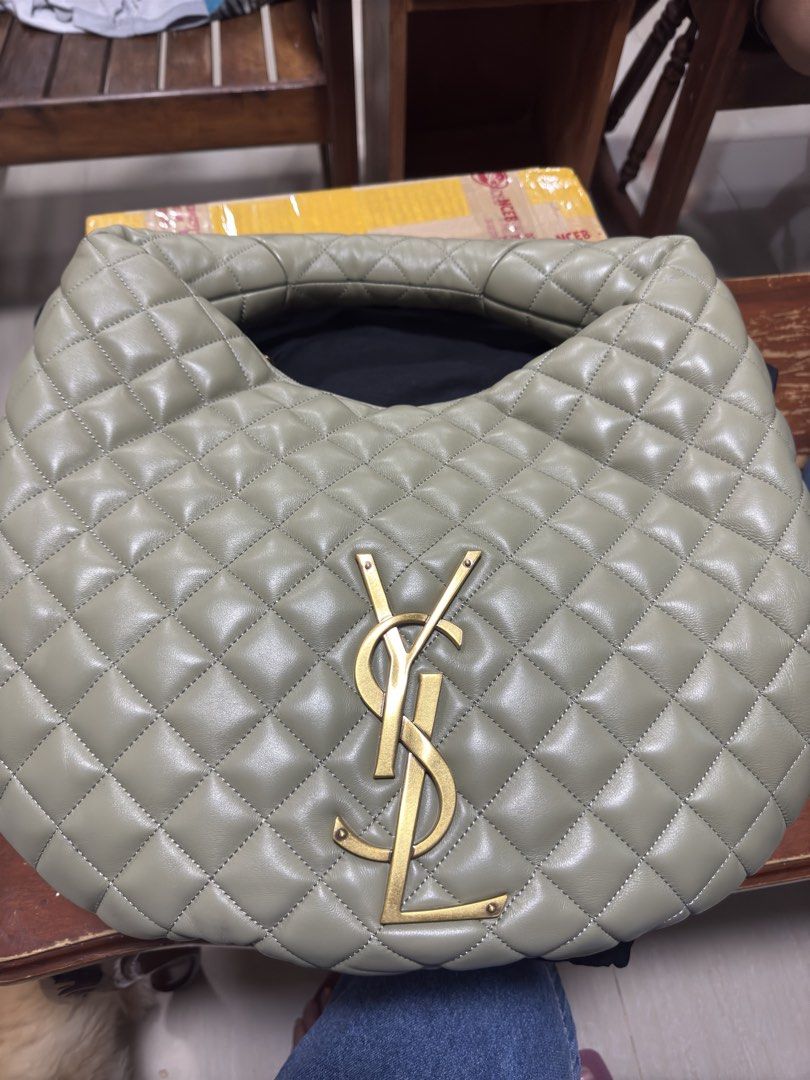 Saint Laurent Quilted Hobo Bag (Category: Luxury Bags & Wallets) located in Manila. Submitted by shedrick (Listing ID 1463631051, Image 1). Description: - Light green Saint Laurent hobo bag - Quilted leather with gold YSL logo - Zipper closure - Interior zippered pocket - Made in Italy - Ideal for everyday use.