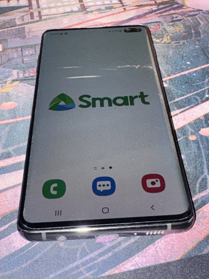 Samsung Galaxy S10+ (128GB) (Category: Samsung) located in Pasig City. Submitted by lazydaisy_ (Listing ID 1463582862, Image 2). Description: - Samsung Galaxy S10+ 128GB - Phone unit only - Smart-locked - Issues: broken glass (LCD is fine), detached Bixby button (still have it) - Price still negotiable.