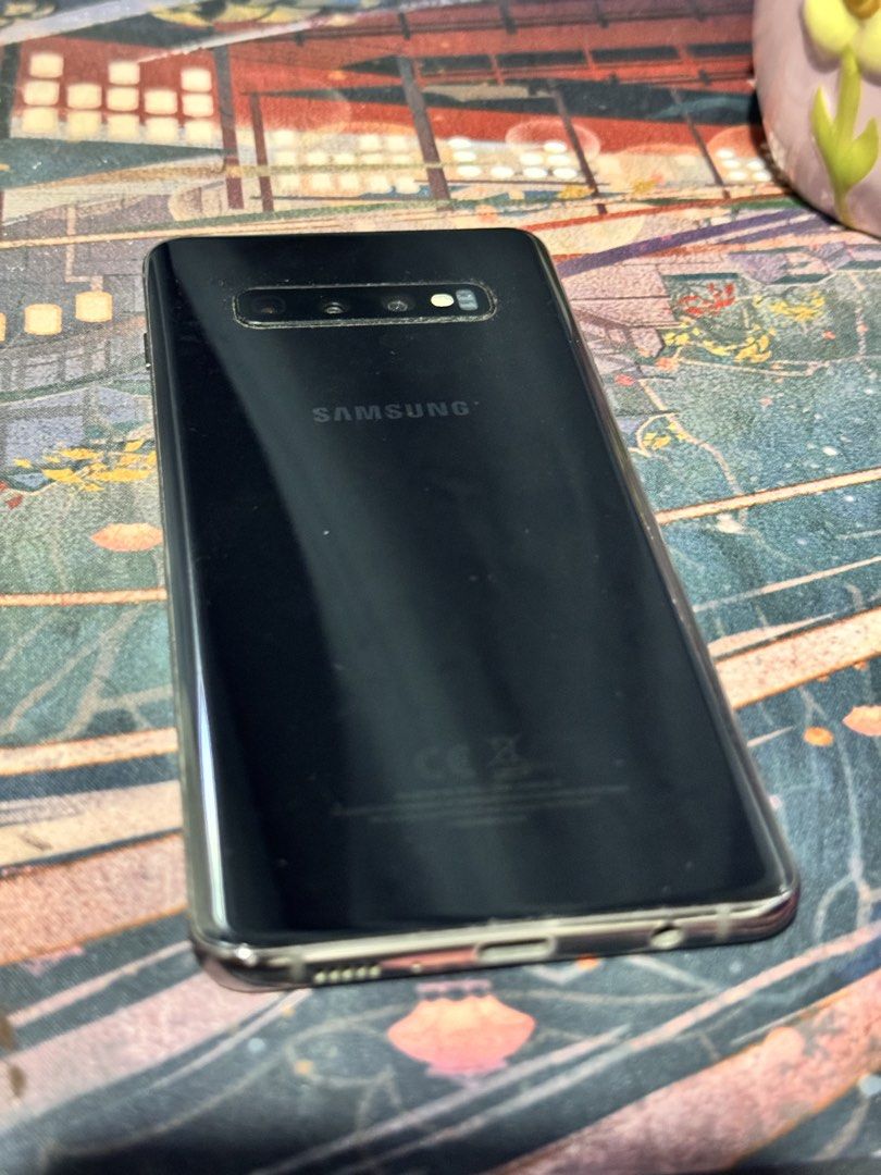Samsung Galaxy S10+ (128GB) (Category: Samsung) located in Pasig City. Submitted by lazydaisy_ (Listing ID 1463582862, Image 3). Description: - Samsung Galaxy S10+ 128GB - Phone unit only - Smart-locked - Issues: broken glass (LCD is fine), detached Bixby button (still have it) - Price still negotiable.