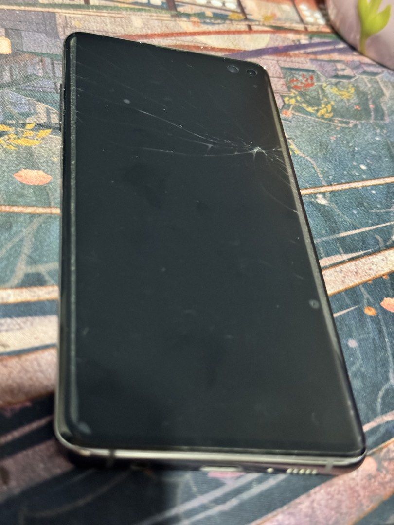 Samsung Galaxy S10+ (128GB) (Category: Samsung) located in Pasig City. Submitted by lazydaisy_ (Listing ID 1463582862, Image 1). Description: - Samsung Galaxy S10+ 128GB - Phone unit only - Smart-locked - Issues: broken glass (LCD is fine), detached Bixby button (still have it) - Price still negotiable.
