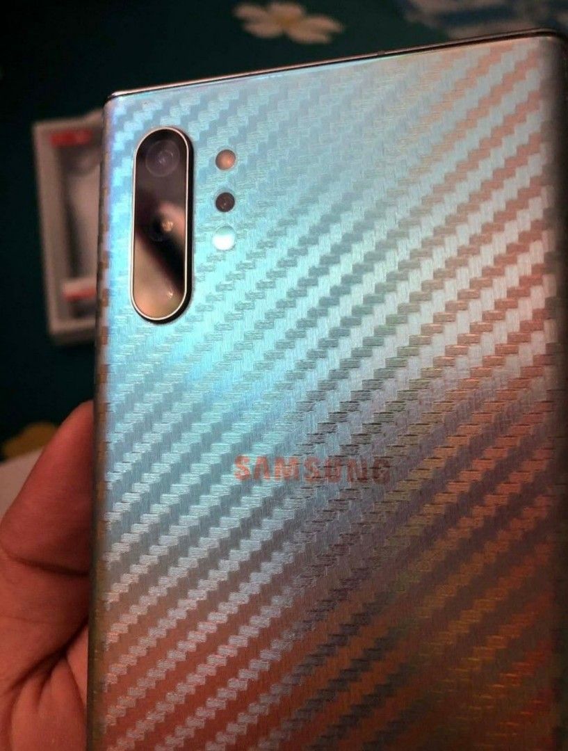 Samsung Note 10+ ⬇️ (Category: Samsung) located in Naic. Submitted by warmflower.09bd07 (Listing ID 1463710454, Image 2). Description: FOR SALE OR SWAP. . -SAMSUNG NOTE 10+ (12GB/256GB) -NTC APPROVED. -ROOTED NA RIN. -OPENLINE ANYSIM AY WORKING. -COLOR: AURA GLOW. -SPEN IS WORKING EXCEPT SA AIR ACTION D NAGANA. -INCLUDE 6 CASE YUNG DALAWA D NAPICTURAN. -INCLUDE CARBON STICKERS AND SCREEN PROTECTOR. -ISSUE:MILD AMOLED BURN COMMON SA MGA NOTE SERIE