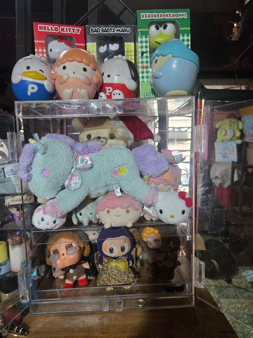 Sanrio & Other Plush Toys Collection (Category: Plushies & Soft Toys) located in Pasig City. Submitted by princesspow (Listing ID 1463595162, Image 2). Description: - Adorable Sanrio plush toy collection! - Features popular characters: Kitty, Badtz-Maru, and Kerokerokeroppi. - Includes a large, cuddly unicorn plush. - Also comes with several smaller character plushies. - All items are in good, pre-loved condition. - Ideal for Sanrio enthusiasts a