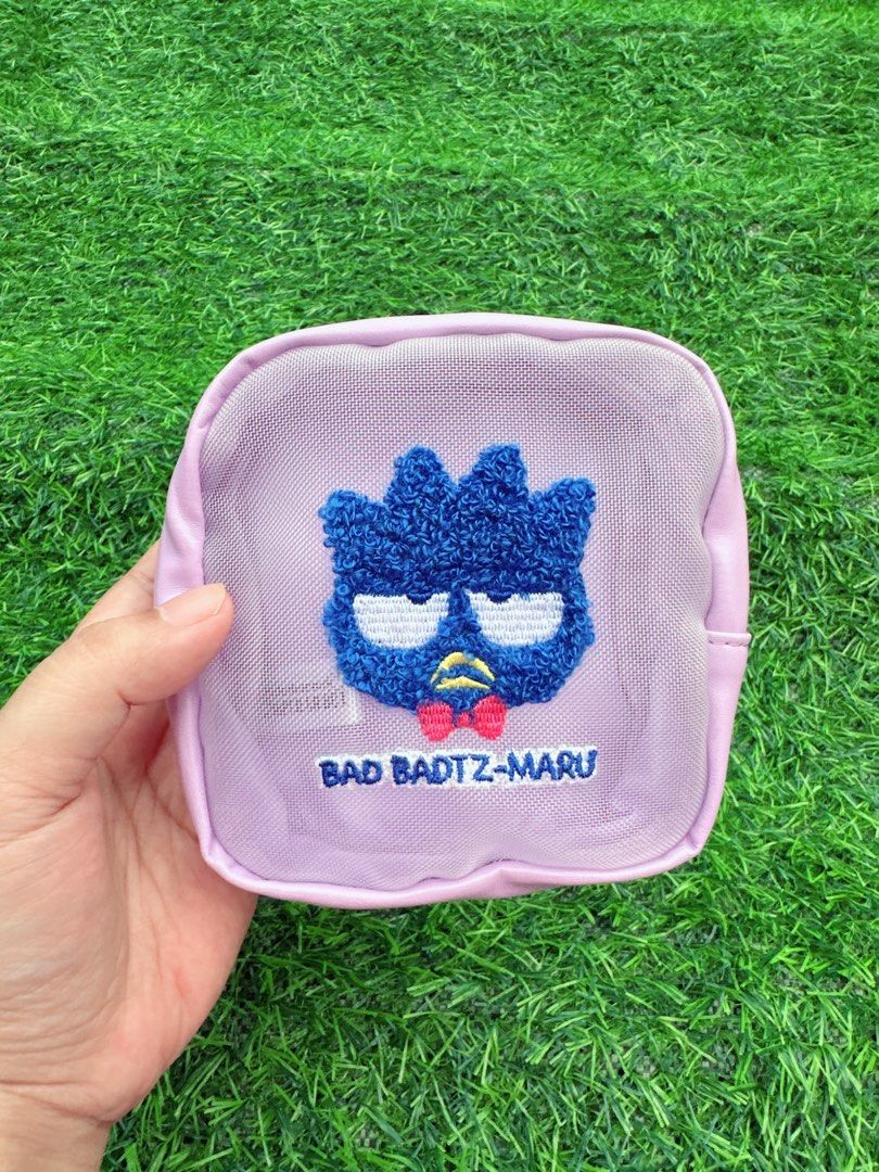 Sanrio Badtz-Maru Embroidered Pouch (Category: Purses & Pouches) located in Manila. Submitted by ronoarabbit.ph (Listing ID 1463575689, Image 1). Description: - Adorable purple pouch featuring Badtz-Maru embroidery. - Convenient mesh front panel. - Secure zipper closure. - Interior label reads '5th Anniversary HAPIDANBU'. - Ideal for storing small essentials and knick-knacks. 📌Payment First Policy, NO COD 📌 First to pay, no long reservations 📍