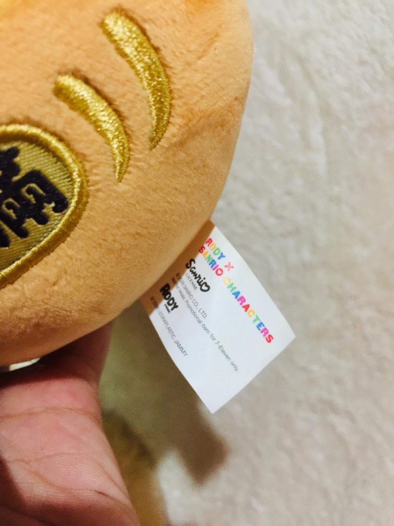 Sanrio Characters x Rody Plush Toy (Category: Plushies & Soft Toys) located in Baguio. Submitted by izza_thrifty (Listing ID 1463665097, Image 2). Description: - Adorable Sanrio Characters x Rody plush toy - Features a cute brown hat - Unique gold coin design on the belly - Ideal for Sanrio and Rody collectors - Makes a wonderful gift idea.