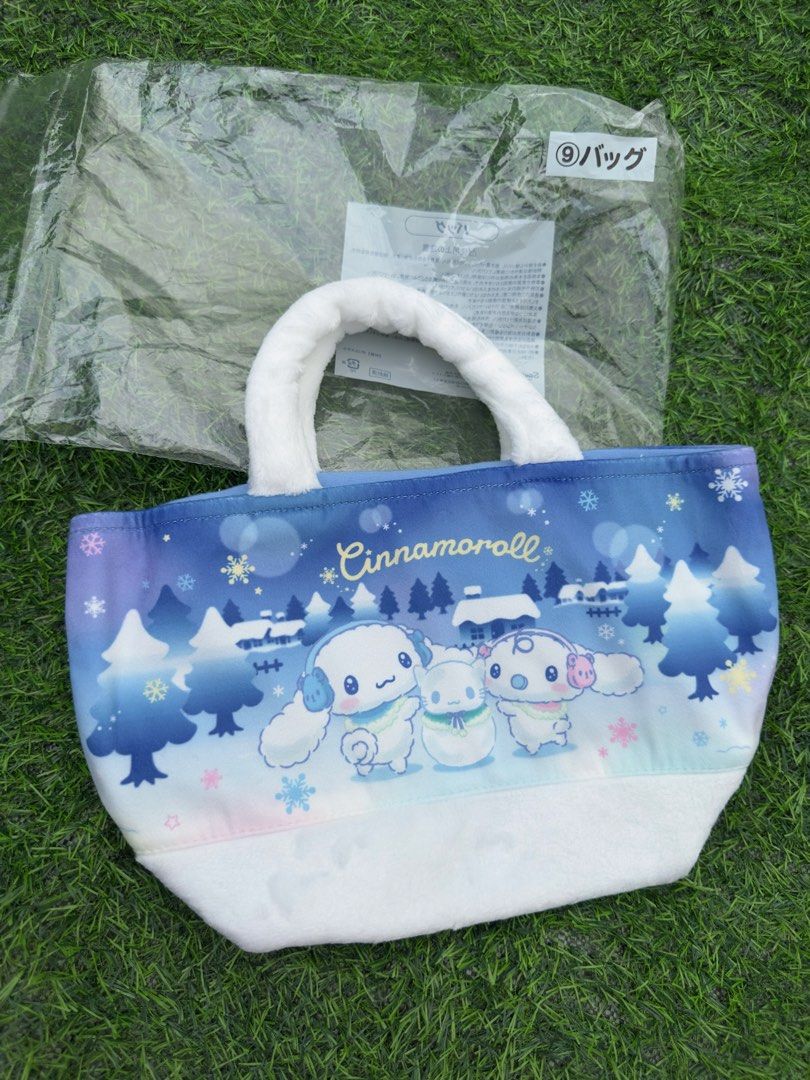 Sanrio Cinnamoroll Winter Scene Tote Bag (Category: Tote Bags) located in Manila. Submitted by ronoarabbit.ph (Listing ID 1463669867, Image 1). Description: KUJI ITEM from Japan - Adorable Cinnamoroll tote bag with a charming winter theme. - Features super soft, fluffy white handles for extra comfort. - Made with a soft fabric exterior for a cozy feel. - Includes a convenient small pocket inside for organizing essentials. - Perfect for everyday u