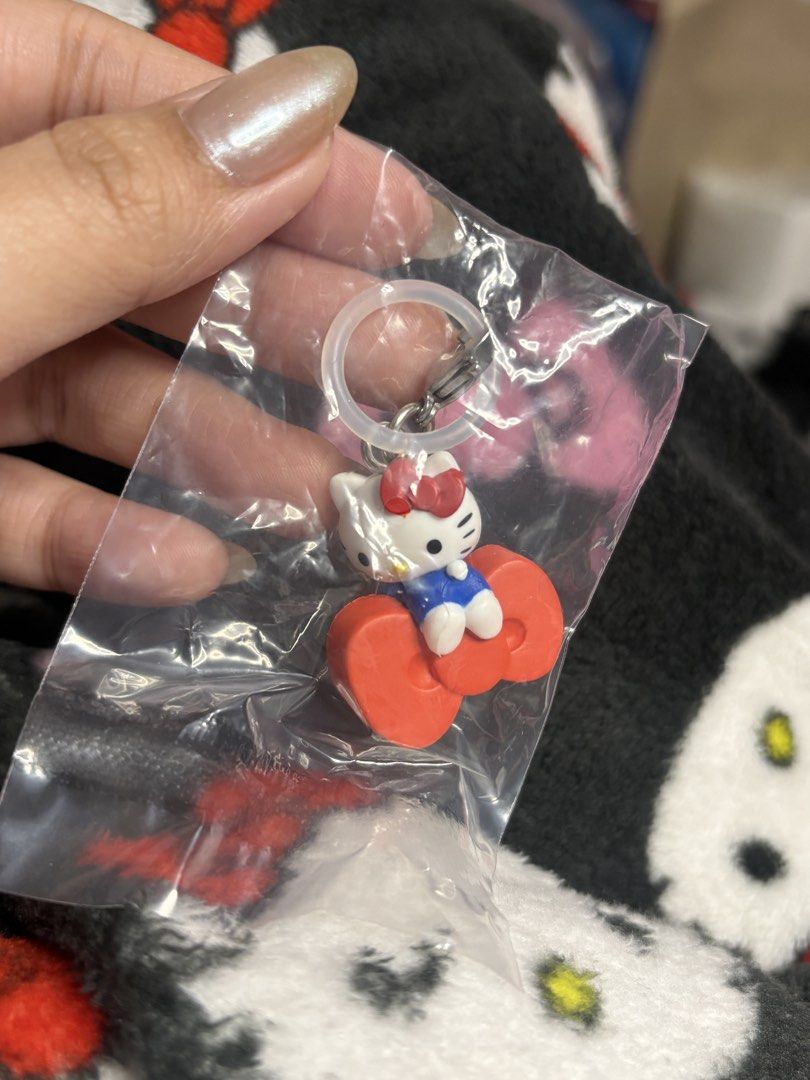 Sanrio Hello Kitty Keychain Gachapon (Category: Character Goods) located in Manila. Submitted by namicloset (Listing ID 1463695534, Image 1). Description: - Adorable Kitty keychain featuring the character sitting on her iconic red bow. - Got it from Gachapon - Small and portable, ideal for attaching to bags or keys or lipstick RFS: Duplicate pull.