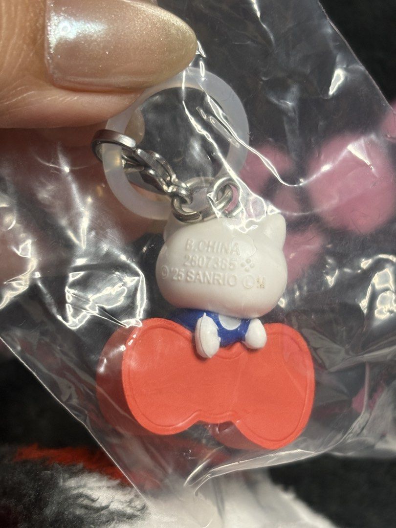 Sanrio Hello Kitty Keychain Gachapon (Category: Character Goods) located in Manila. Submitted by namicloset (Listing ID 1463695534, Image 2). Description: - Adorable Kitty keychain featuring the character sitting on her iconic red bow. - Got it from Gachapon - Small and portable, ideal for attaching to bags or keys or lipstick RFS: Duplicate pull.