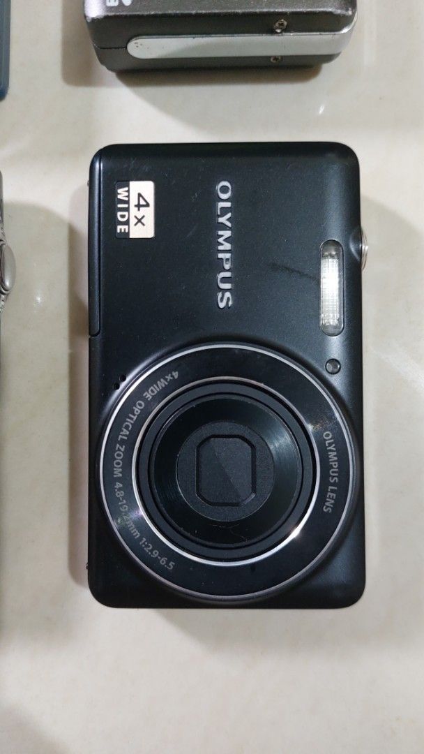 Sanyo & Olympus Digital Cameras - 7.0MP & 4x Wide (Category: Cameras) located in Quezon City. Submitted by christopher.torio18 (Listing ID 1463695151, Image 2). Description: Sanyo & Olympus Digital Camera Untested no battery take all for 950.