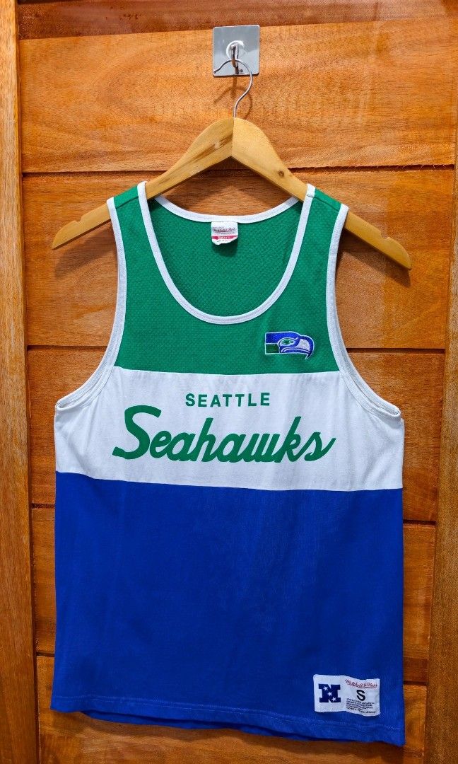 SEAHAWKS TANKTOP BY MITCHELL & NESS (TWO-TONE) (Category: Tshirts & Polo Shirts ) located in Tabuk. Submitted by gooddropsofficial (Listing ID 1463692141, Image 3). Description: SEAHAWKS TANKTOP BY MITCHELL & NESS (TWO-TONE) ▪️WIDTH: 18" ▪️LENGTH: 27.5" ▪️SIZE: SMALL ▪️COLOR RATE: GOOD AS NEW ▪️CONDITION: GOOD AS NEW ▪️ISSUE: NONE ▪️WASHED AND READY TO USE.