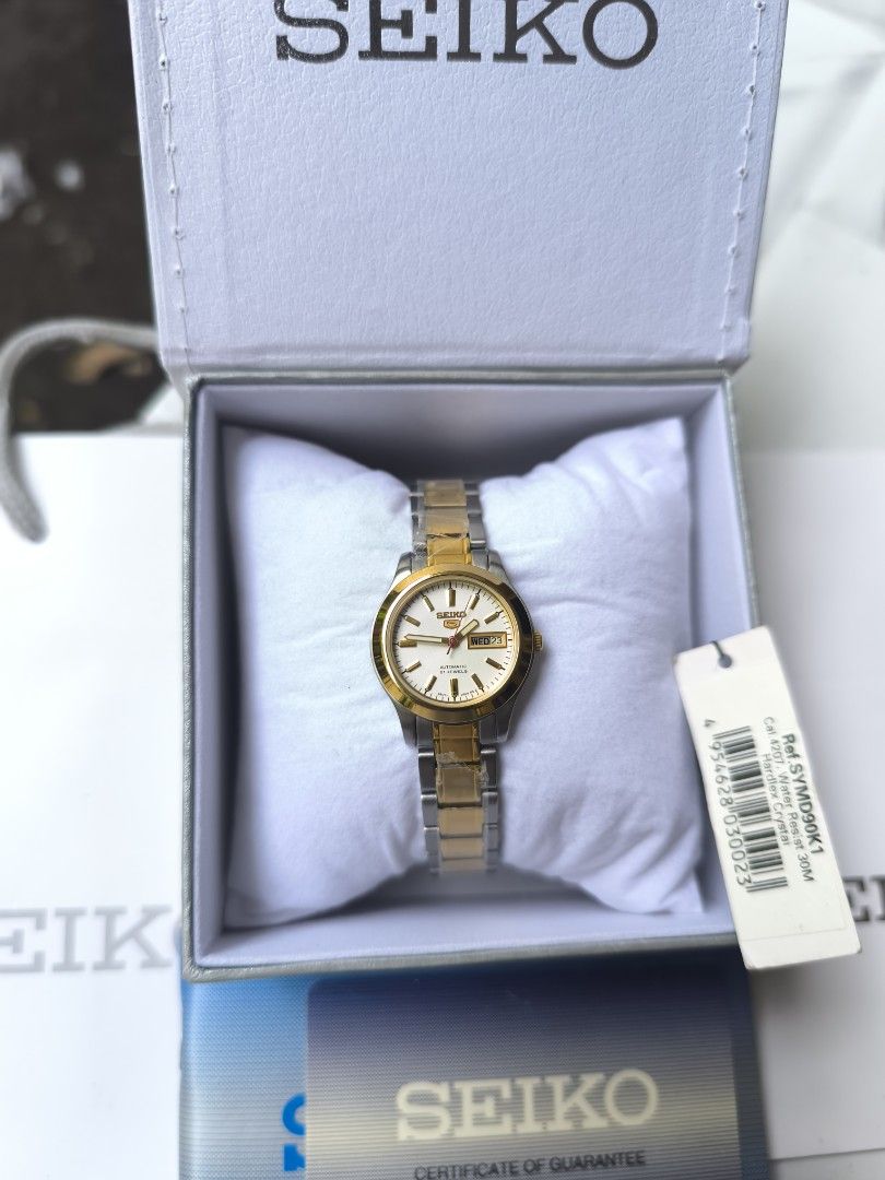 Seiko 5 Automatic SYMD90K1 (Category: Women's Watches) located in Iriga City. Submitted by chris569 (Listing ID 1463665040, Image 1). Description: FOR SALE❗❗ Seiko 5 automatic women's watch SYMD90K1 two tone 4207 movement 26mm case diameter with box, manual, card, tag and paper bag open for nationwide shipping via LBC Iriga City, Camarines Sur location.
