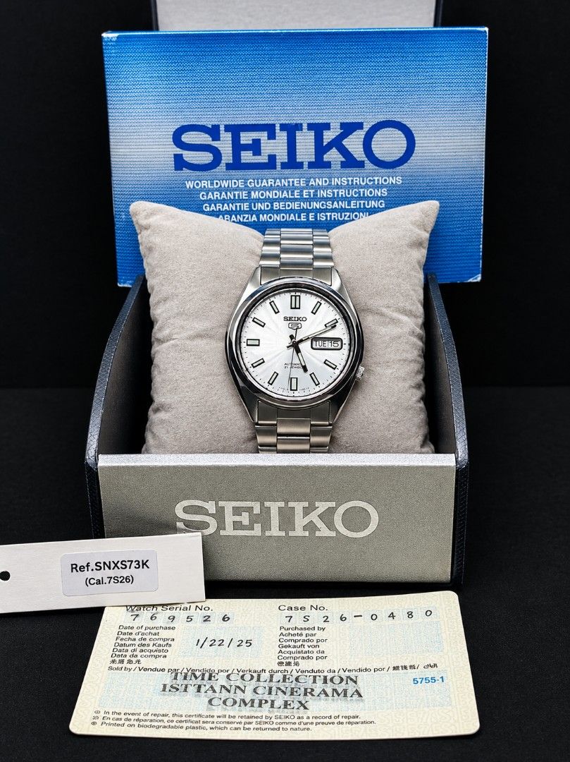 Seiko 5 SNXS73K Sunburst Silver (Category: Luxury Watches) located in Manila. Submitted by sir.chief1 (Listing ID 1462020065, Image 1). Description: The Seiko 5 SNXS73K (often listed as SNXS73K1 or SNXS73) is a highly celebrated, entry-level automatic dress watch famous for punching far above its weight class in terms of design and value. Sunburst silver dial with highly luminescent LumiBrite hands and hour markers, protected by a scratch-resista
