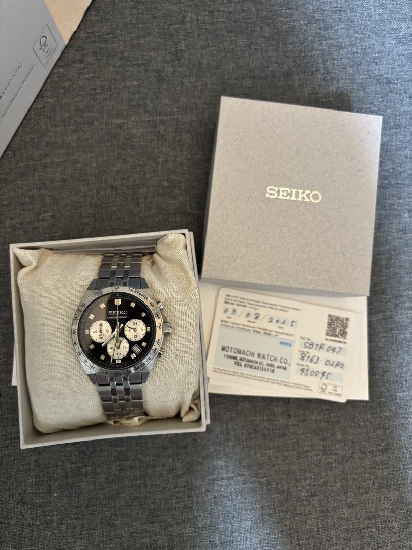 Seiko Chronograph Watch with Box and Papers (Category: Men's Watches) located in Manila. Submitted by keendeer.43add0 (Listing ID 1463660128, Image 1). Description: - Seiko Chronograph Watch - Classic black dial with a sleek silver band - Comes with original Seiko box - Includes Motomachi Watch Co. warranty card dated 03/08/2025.