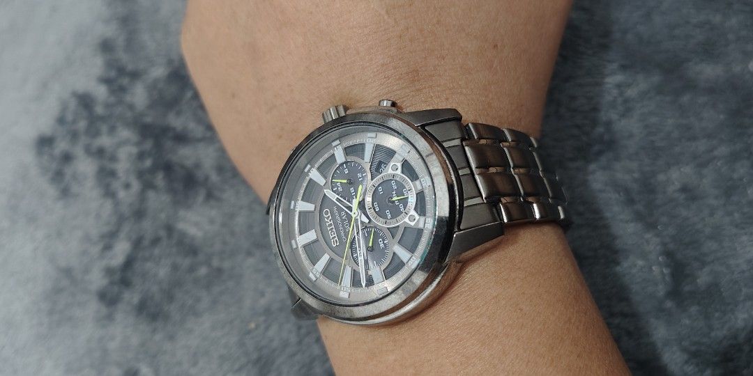 Seiko Core Solar Grey IP Steel Chronograph (Category: Men's Watches) located in Cebu City. Submitted by aceoftime (Listing ID 1463718978, Image 2). Description: In excellent condition Model: SSC391 Powered by light energy japanese V175 solar quartz Stylish black dial with white accents gunmetal tone luminous skeleton hands and index hour markers with the chronograph and 12/24 hr time, 6 month power reserve when fully charged 100m water resist IP 