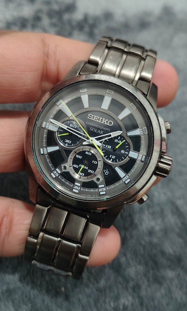 Seiko Core Solar Grey IP Steel Chronograph (Category: Men's Watches) located in Cebu City. Submitted by aceoftime (Listing ID 1463718978, Image 1). Description: In excellent condition Model: SSC391 Powered by light energy japanese V175 solar quartz Stylish black dial with white accents gunmetal tone luminous skeleton hands and index hour markers with the chronograph and 12/24 hr time, 6 month power reserve when fully charged 100m water resist IP 
