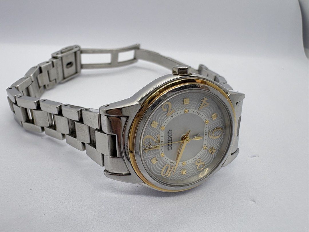 Seiko Lukia Solar Radio Wave Control Watch (Category: Men's Watches) located in Quezon City. Submitted by rentoti (Listing ID 1463620488, Image 3). Description: - Seiko Solar Radio Wave Controlled Watch - Silver-tone metal bracelet with elegant gold-tone bezel accents - Clean white dial with matching gold-tone hour markers and hands - working but hard to set the time since its a radio wave kayo na po magset -selling as is.