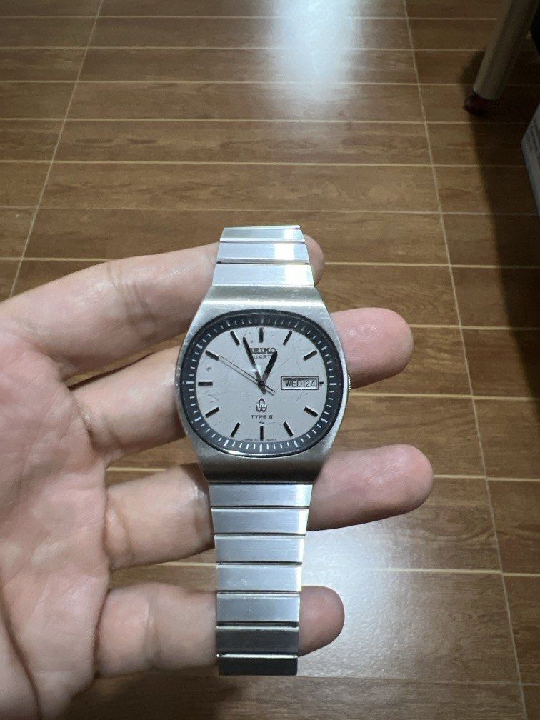 Seiko Quartz type II TV dial (Category: Men's Watches) located in Porac. Submitted by .ultraboy. (Listing ID 1463714757, Image 2). Description: Vintage Seiko Type II Quartz Watch (cal. 7123-5030 / 503A) featuring a textured white/silver dial, integrated stainless steel bracelet, and a day-date complication. Good working condition..