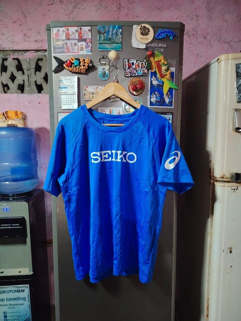 Seiko x Asics Drifit Tee (Category: Tshirts & Polo Shirts ) located in General Santos City (Dadiangas). Submitted by rafaelmir09800 (Listing ID 1463694419, Image 1). Description: - Blue t-shirt - Features Seiko logo on front - Asics logo on back and sleeve - Made by Asics - Ideal for sports or casual wear - Comfortable and breathable fabric.
