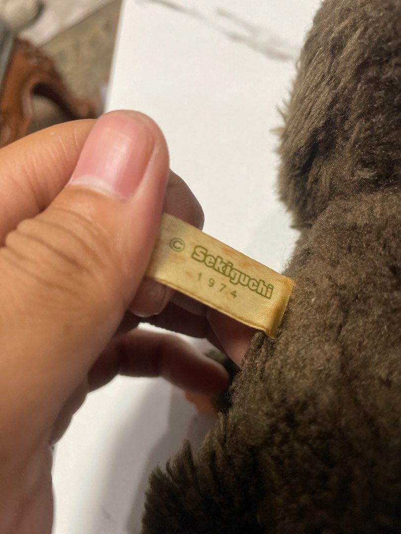 Sekiguchi Monchhichi Doll 1974 (Category: Plushies & Soft Toys) located in Manila. Submitted by gresonesjames (Listing ID 1463644752, Image 2). Description: FOR SALE!! - Vintage Sekiguchi Monchhichi doll - Original release year: 1974 - Features: Brown furry body, plastic face, thumb-sucking detail - Adorable pink boots - Perfect collectible for fans of classic toys - A true piece of toy history DM for price & details. 📦 Shipping available ⚠️ Ple