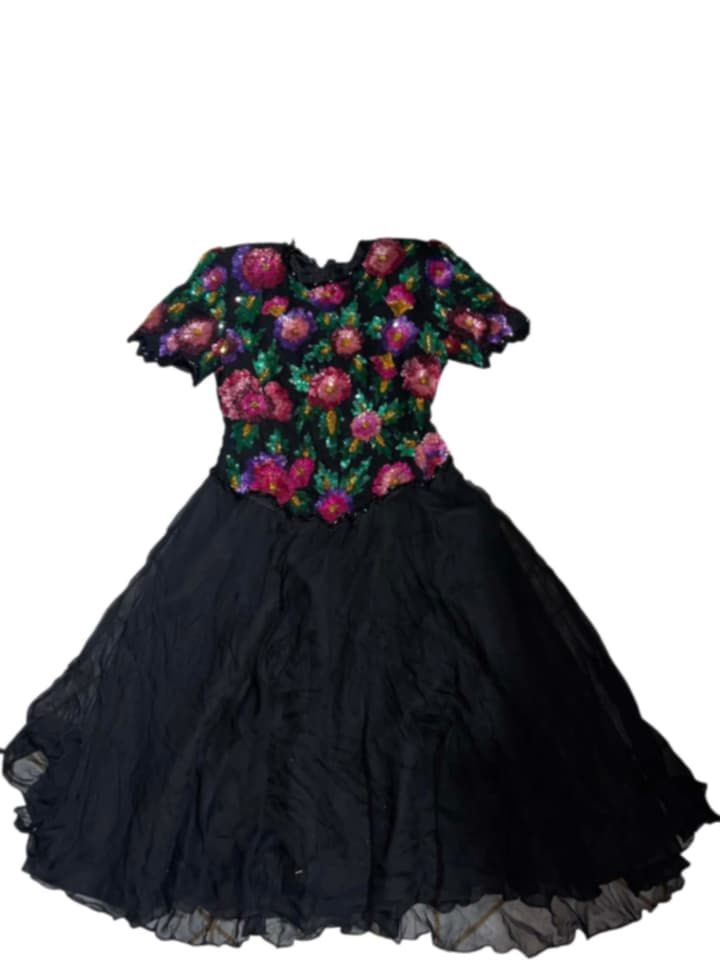Sequin Floral Black Dress (Category: Dresses) located in Manila. Submitted by fastforest_65f95b (Listing ID 1463665644, Image 1). Description: - Elegant black dress - Features a dazzling sequined floral bodice - Short sleeves for comfort - Flattering full skirt - Ideal for parties, weddings, or any special occasion - Unique and eye-catching design.