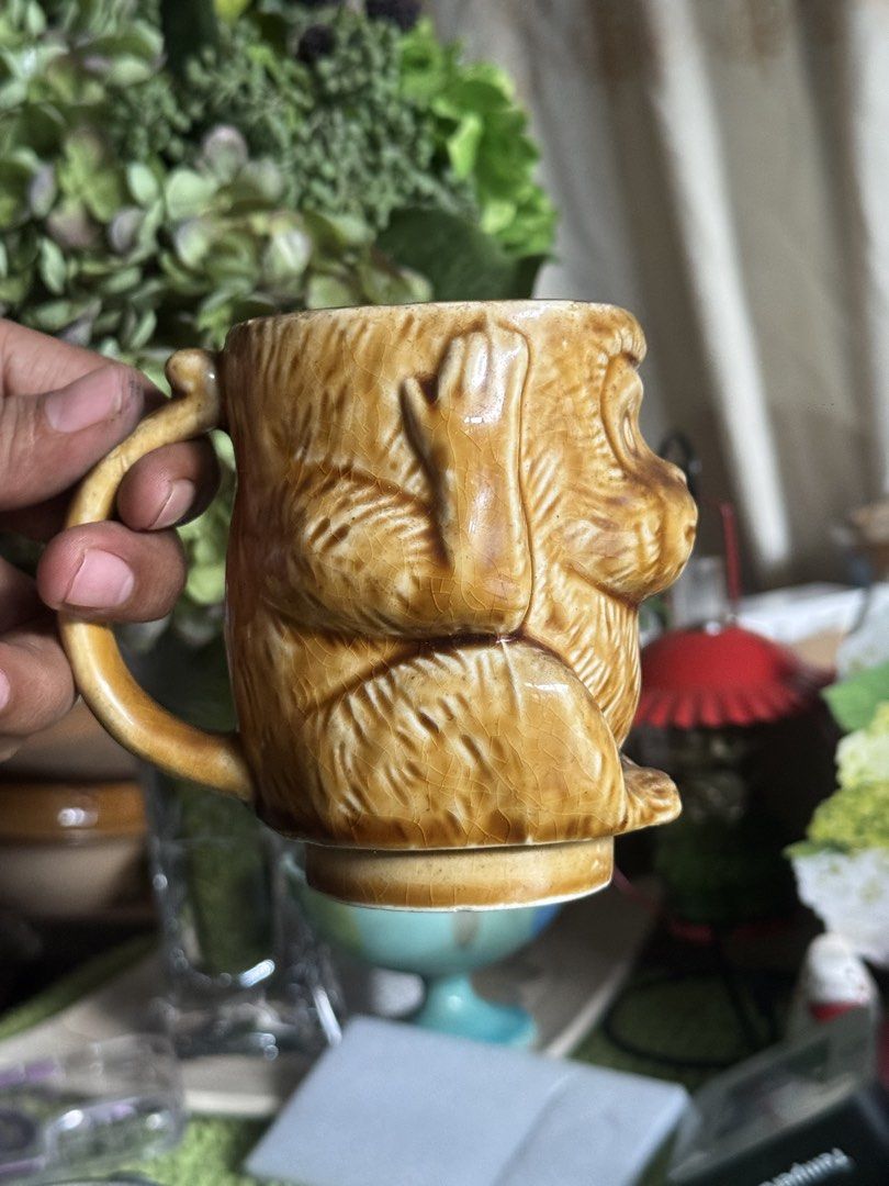Set of 2 Monkey Mugs - See No Evil, Hear No Evil (Category: Coffee & Tea Tableware) located in Sual. Submitted by wakusurplus07031121 (Listing ID 1463647949, Image 1). Description: - Adorable monkey mugs available in brown and blue. - Each mug represents a 'see no evil' or 'hear no evil' monkey. - Ideal for enjoying your favorite coffee or tea. - Makes a unique collectible item. - A fun and quirky gift idea. - Adds a touch of personality to your 