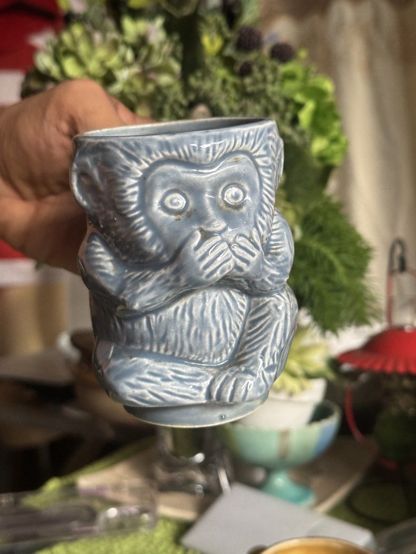 Set of 2 Monkey Mugs - See No Evil, Hear No Evil (Category: Coffee & Tea Tableware) located in Sual. Submitted by wakusurplus07031121 (Listing ID 1463647949, Image 3). Description: - Adorable monkey mugs available in brown and blue. - Each mug represents a 'see no evil' or 'hear no evil' monkey. - Ideal for enjoying your favorite coffee or tea. - Makes a unique collectible item. - A fun and quirky gift idea. - Adds a touch of personality to your 
